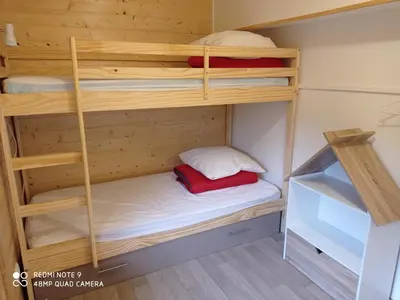 Un ou plusieurs lits dans un hébergement de l'établissement Chalet des cascades