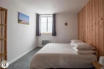 Un ou plusieurs lits dans un hébergement de l'établissement Gîte de Granit GRIS