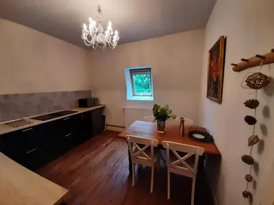 Cuisine ou kitchenette dans l'établissement Chateau Sourliavoux, appartement en chambres d'hôtes