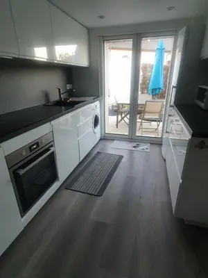 Cuisine ou kitchenette dans l'établissement gîte m et m