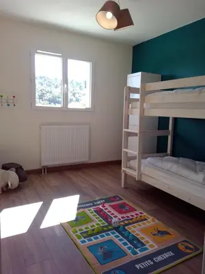 Un ou plusieurs lits dans un hébergement de l'établissement La Masquénada 85 m2, neuve, moderne, confort avec grand garage