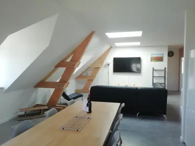 Télévision ou salle de divertissement dans l'établissement Gîte de Granit Noir