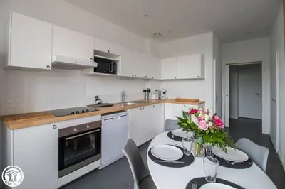 Cuisine ou kitchenette dans l'établissement Gîte de Granit Bleu