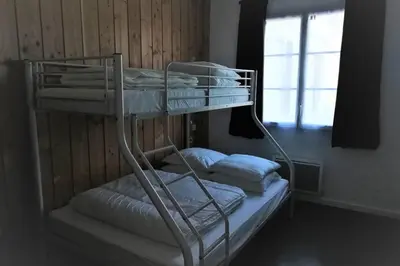 Un ou plusieurs lits dans un hébergement de l'établissement Gîte de Granit Bleu