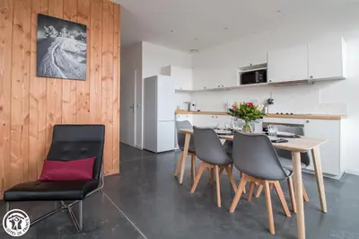 Cuisine ou kitchenette dans l'établissement Gîte de Granit ROSE