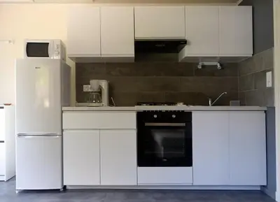Cuisine ou kitchenette dans l'établissement GITE à LA FERME PRES VULCANIA-GR89