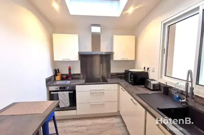 Cuisine ou kitchenette dans l'établissement CLIM Jolie maison de 60 m2 avec jardin
