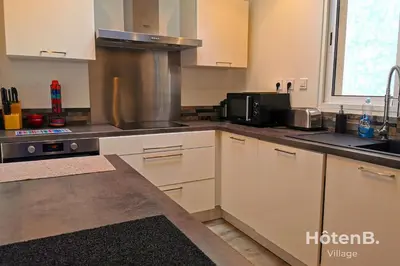 Cuisine ou kitchenette dans l'établissement CLIM Jolie maison de 60 m2 avec jardin
