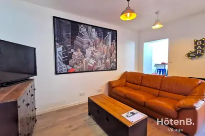 Télévision ou salle de divertissement dans l'établissement CLIM Jolie maison de 60 m2 avec jardin