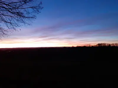 Lever ou coucher de soleil vu de la maison de vacances ou à proximité