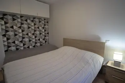 Un ou plusieurs lits dans un hébergement de l'établissement Villa Jean Julien - Le Capucin - Wifi - 1 chambre - 4 personnes