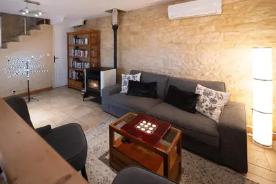 Coin salon dans l'établissement Le Manoir de Carlucet Gite