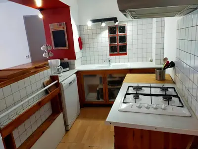 Cuisine ou kitchenette dans l'établissement Agréable appartement de 48 m² en RDC