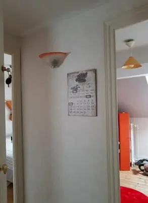 Un ou plusieurs lits dans un hébergement de l'établissement Appartement cosy pour une pause sereine et chaleureuse