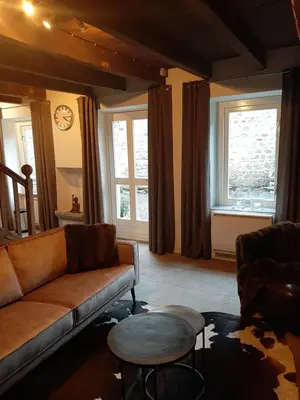 Coin salon dans l'établissement Luxe gîte met authentieke kamers in de Creuse, France