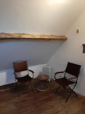 Coin salon dans l'établissement Luxe gîte met authentieke kamers in de Creuse, France
