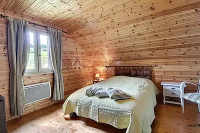 Un ou plusieurs lits dans un hébergement de l'établissement Chalet Lorine