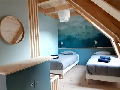 Un ou plusieurs lits dans un hébergement de l'établissement Les Burons du Mont-Dore