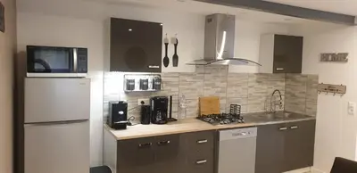Cuisine ou kitchenette dans l'établissement Petite maison en pierre au coeur du Périgord noir proche de Sarlat et Rocamadour