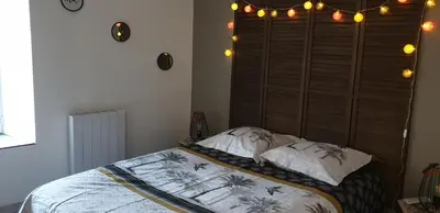 Un ou plusieurs lits dans un hébergement de l'établissement Petite maison en pierre au coeur du Périgord noir proche de Sarlat et Rocamadour