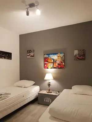 Un ou plusieurs lits dans un hébergement de l'établissement Petite maison en pierre au coeur du Périgord noir proche de Sarlat et Rocamadour