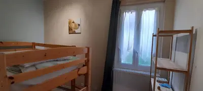 Un ou plusieurs lits dans un hébergement de l'établissement Meublé 2 chambres Wifi balcon 52m2 Centre La Bourboule