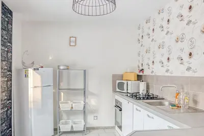 Cuisine ou kitchenette dans l'établissement Gentiane
