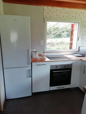 Cuisine ou kitchenette dans l'établissement Gîte Granit des Fraux