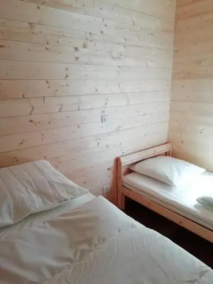 Un ou plusieurs lits dans un hébergement de l'établissement Gîte Granit des Fraux