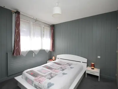 Un ou plusieurs lits dans un hébergement de l'établissement Confortable T3 au Mont-Dore, proche Thermes - FR-1-608-21