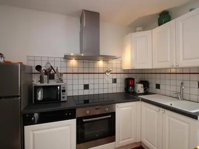 Cuisine ou kitchenette dans l'établissement Appartement T3 Mont Dore, Wifi, 5 pers - FR-1-608-35