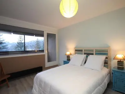 Un ou plusieurs lits dans un hébergement de l'établissement Bel appartement T4 au Mont-Dore - Wifi inclus - FR-1-608-9