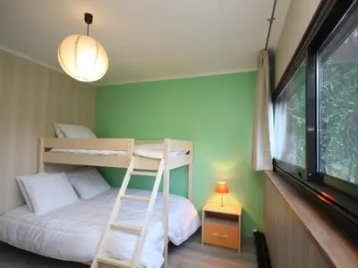Télévision ou salle de divertissement dans l'établissement Bel appartement T4 au Mont-Dore - Wifi inclus - FR-1-608-9