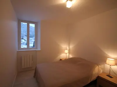 Un ou plusieurs lits dans un hébergement de l'établissement Duplex rénové 3 pièces, 6 pers., lumineux, Mont-Dore - FR-1-608-30