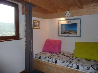 Un ou plusieurs lits dans un hébergement de l'établissement Duplex au Mont-Dore avec Wifi et Parking privatif - FR-1-608-51