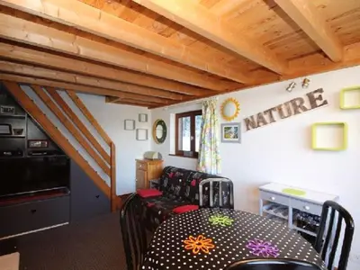 Coin salon dans l'établissement Duplex au Mont-Dore avec Wifi et Parking privatif - FR-1-608-51