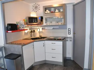 Cuisine ou kitchenette dans l'établissement Duplex au Mont-Dore avec Wifi et Parking privatif - FR-1-608-51