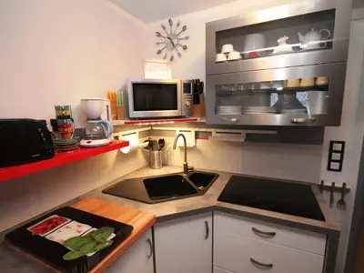 Cuisine ou kitchenette dans l'établissement Duplex au Mont-Dore avec Wifi et Parking privatif - FR-1-608-51