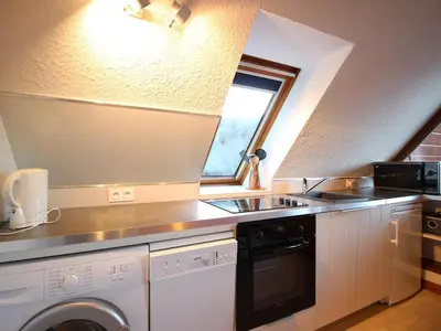 Cuisine ou kitchenette dans l'établissement Duplex T3 avec terrasse et garage, WiFi, pour 6 personnes au Mont-Dore - FR-1-608-72