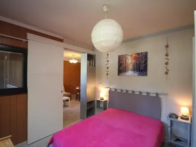 Un ou plusieurs lits dans un hébergement de l'établissement Appartement T2 au Mont Dore avec Balcon et WIFI - FR-1-608-58