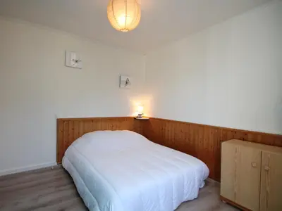 Un ou plusieurs lits dans un hébergement de l'établissement LE MONT DORE - Appartement T3 près de l'hyper centre - FR-1-608-84