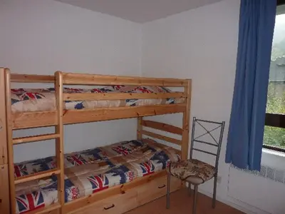 Un ou plusieurs lits superposés dans un hébergement de l'établissement Studio cosy au Mont-Dore, proche centre avec parking - FR-1-608-122