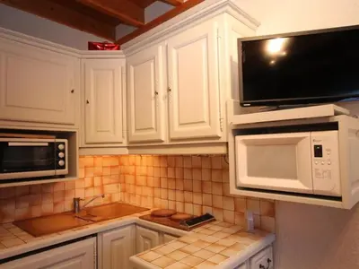 Cuisine ou kitchenette dans l'établissement Mont-Dore Duplex 35m², Balcon, Wi-Fi, 6pers - FR-1-608-156
