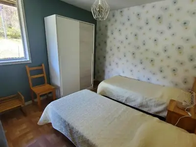 Un ou plusieurs lits dans un hébergement de l'établissement Appartement T3 au Mont-Dore avec terrasse et WiFi - FR-1-608-175