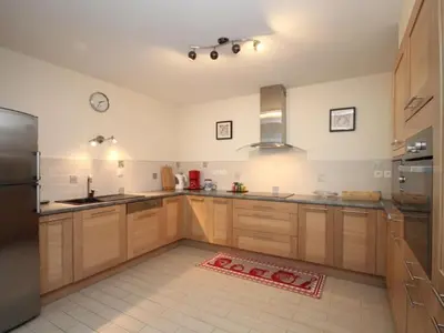 Cuisine ou kitchenette dans l'établissement Grand T3 au Mont-Dore avec Terrasse et Parking - FR-1-608-177