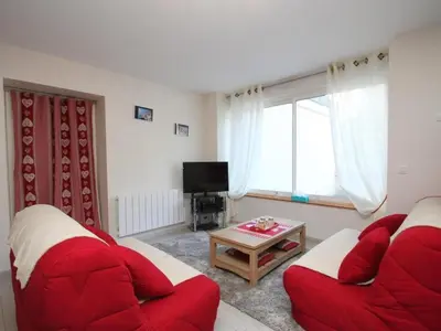 Télévision ou salle de divertissement dans l'établissement Grand T3 au Mont-Dore avec Terrasse et Parking - FR-1-608-177