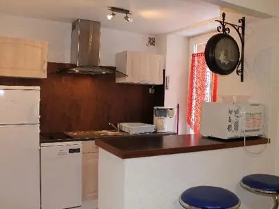 Cuisine ou kitchenette dans l'établissement T2 central proche thermes avec wifi - FR-1-608-183