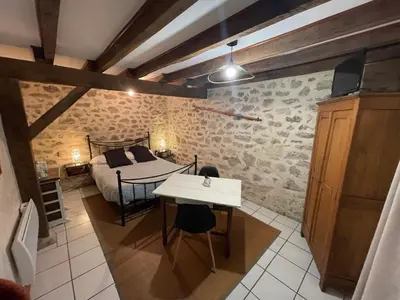 Coin salon dans l'établissement Maison d'hôtes Ourdeaux et Gite Chez Rouchon