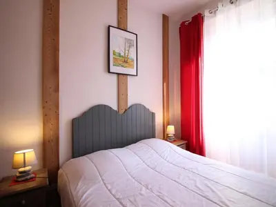 Un ou plusieurs lits dans un hébergement de l'établissement Charmant T3 au Mont-Dore avec WiFi, centre-ville, pour 6 pers. - FR-1-608-17