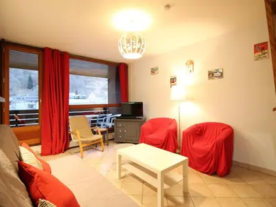 Coin salon dans l'établissement Beau Duplex T3 avec Balcon, Wifi et Parking à 300m du Centre - FR-1-608-16